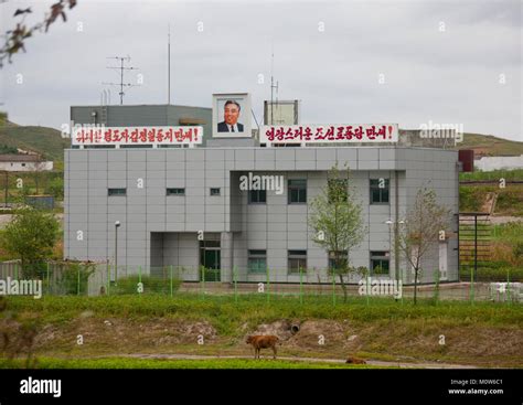 Reunification train station with a Kim il Sung portrait on the top ...