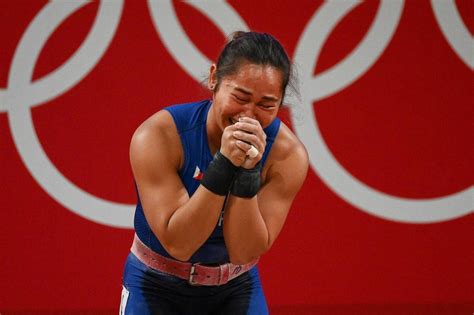 'So proud': Hidilyn Diaz hailed for historic Olympic gold | The Manila ...