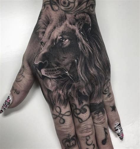 50+ Powerful Lion & Lioness Tattoos Certain | Lion hand tattoo, Lioness ...