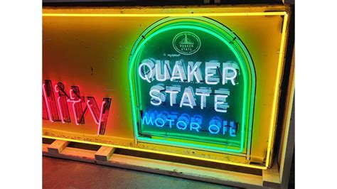 Quaker State Single-Sided Tin Neon Sign at Indy 2023 as M374 - Mecum Auctions