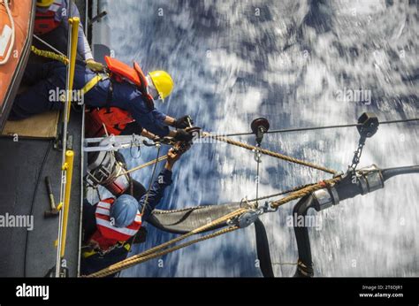 USS Frank Cable participate in a refueling at sea with USNS Guadalupe ...