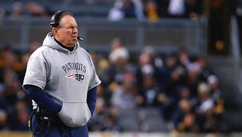 Why Does Bill Belichick Cut The Sleeves Off His Sweatshirts? The Answer ...