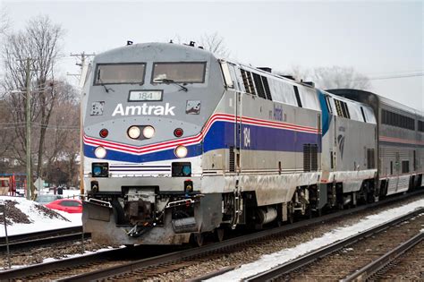 AMTK 184, dressed in Amtrak’s Phase IV paint scheme, passes through ...