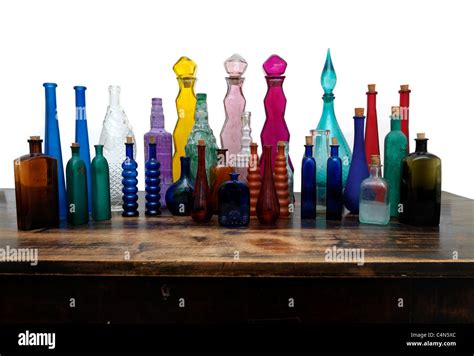 A Collection Of Glass Bottles All Different Shapes, Sizes And Colours Stock Photo - Alamy