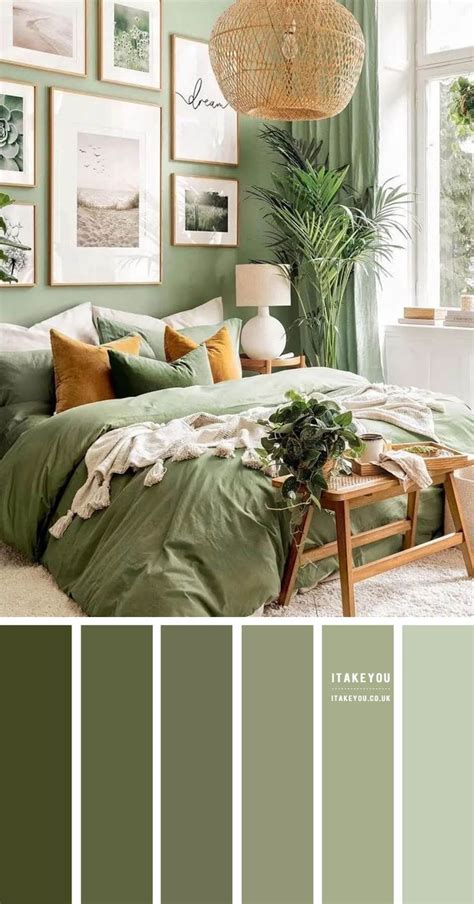 a bedroom with green walls and pictures on the wall