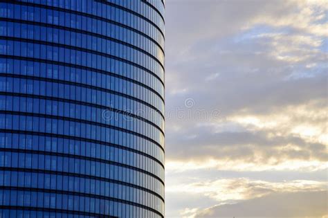 Side View of the Modern Glass Skyscraper Facade on the Late Sunrise Sky ...