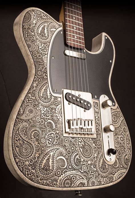 Dean Zelinsky Guitars Announces New Engraved Paisley Dellatera Guitar With Antiqued Metalized Finish