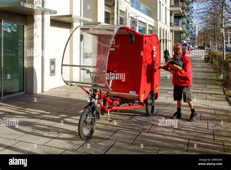 Postman bike post man mail hi-res stock photography and images - Alamy