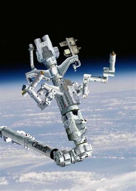 Dextre the robot passes early test outside station