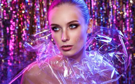 Beauty Portrait of a High Fashion Woman in Colorful Bright Neon Lights Posing on Colourful Vivid ...