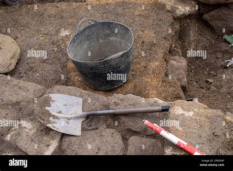 Tools in an archaeological excavation, work tools Stock Photo - Alamy