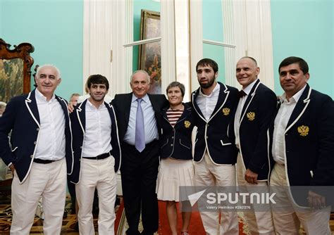 President Vladimir Putin gives government awards to Olympic medalists ...