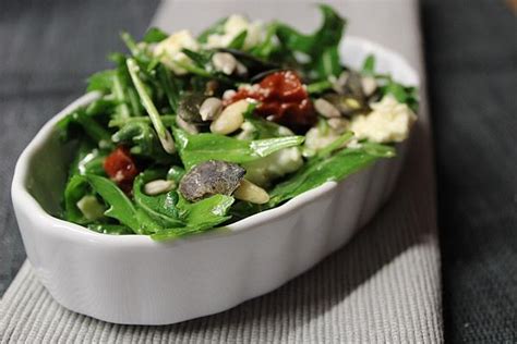 Rocket Salad with Sun-dried Tomatoes, Feta Cheese and Pine Nuts