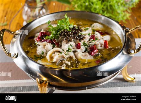 Boiled Fish with Pickled Cabbage and Chili,Popular Chinese food Stock Photo - Alamy