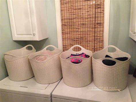 Assign a laundry bin per family member, for easy sorting while folding. These are great as they ...