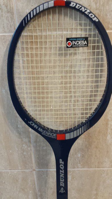 Dunlop champion John McEnroe racket tennis vintage. - Catawiki