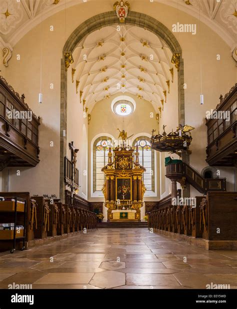 Interior and altar of Trinity Evangelical Lutheran church in the medieval town of Regensburg ...