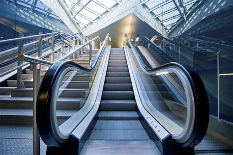 Bringing luggage on airport escalators could lead to disaster | Travel ...