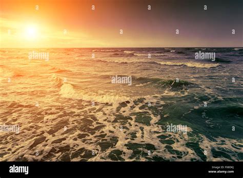 Golden sunset over sea Stock Photo - Alamy