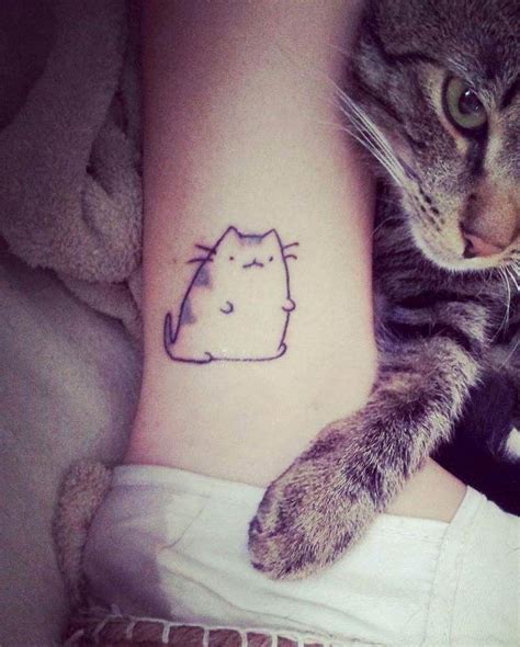 Cute cartoon cat tattoo on ankle - Tattooimages.biz Cat Paw Tattoos, Cartoon Tattoos, Mini ...