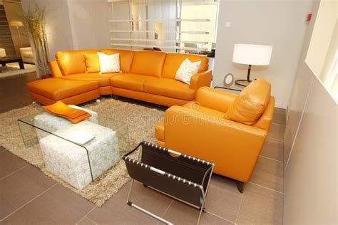 Orange Leather Couch and Armchair Set in Furniture Stock Photo - Image of commercial, furniture ...