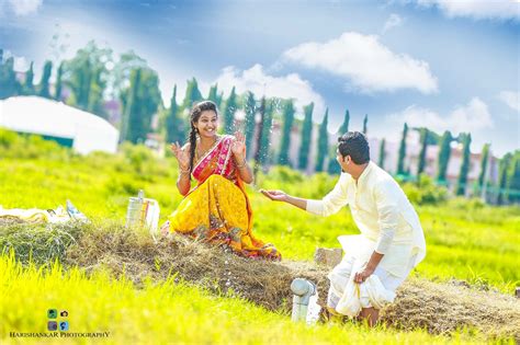 a man and woman kneeling down in the grass