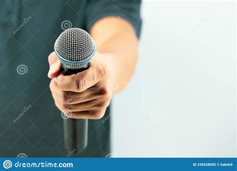 Close Up Hand Holding Microphone for Speaker Speech Presentation Stage ...