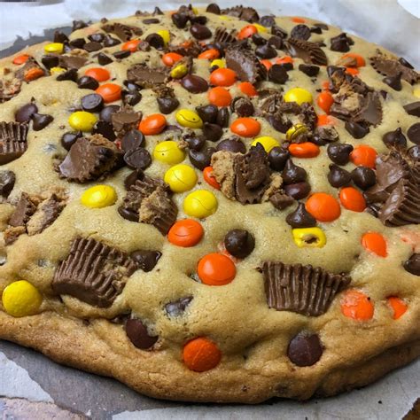 Giant Cookie stuffed with Reese's Pieces, mini Reese's Peanutbutter ...