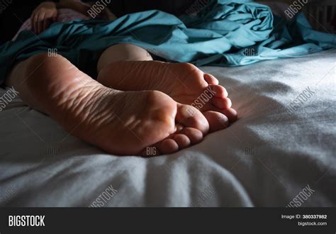 Women's Feet On Bed Image & Photo (Free Trial) | Bigstock