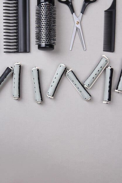 Premium Photo | Professional hairdresser tools on gray background