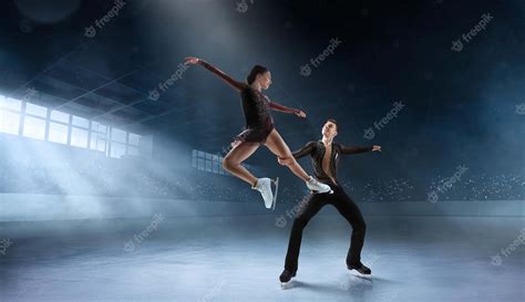 Premium Photo | Figure skating in ice arena