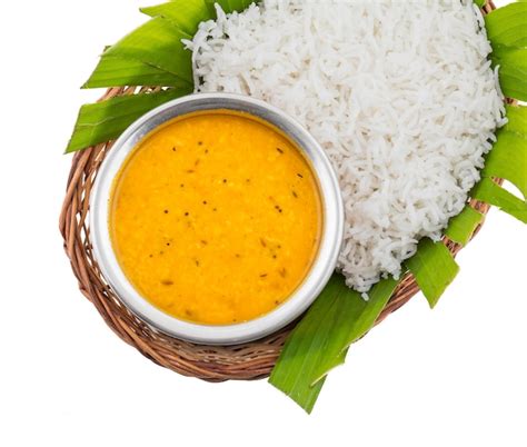 Premium Photo | Indian traditional cuisine dal fry or rice on white background