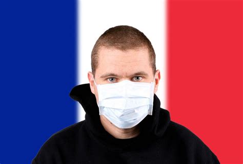 Man wearing protection face mask with flag of France - Creative Commons Bilder