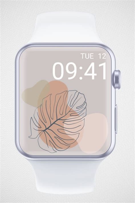 an apple watch with the time displayed on it's face and leaves in the ...