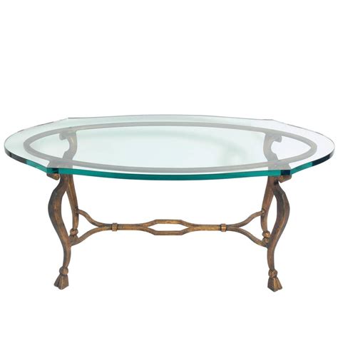 Elegant Gilt Metal Oval Coffee Table For Sale at 1stdibs