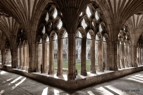 The gothic arches and tracery of the cloister at Canterbury Cathedral ...