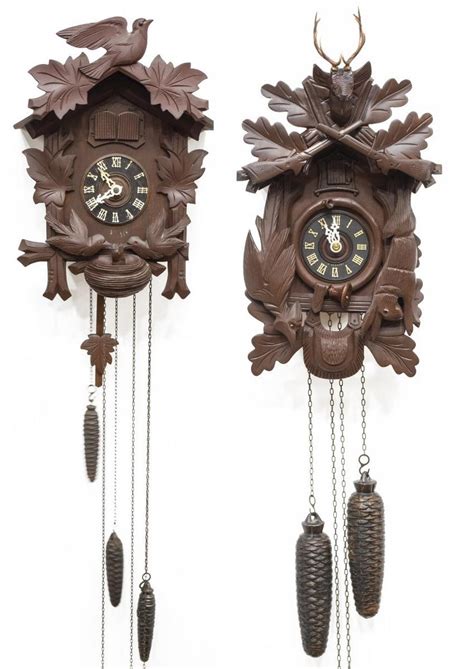 (2) GERMAN BLACK FOREST CARVED CUCKOO CLOCKS