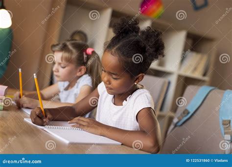 Little Girls Solving Math Problems Stock Photo - Image of home ...