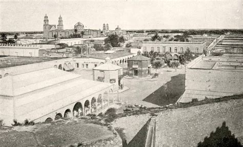 Downtown Merida in 1897. In the foreground, the mercado with the arched ...