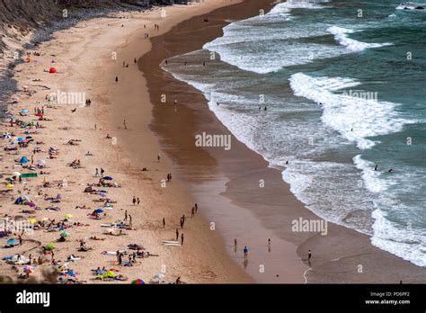 Praia da Arrifana,beach popular for surfing, Aljezur, Algarve, Portugal Stock Photo - Alamy