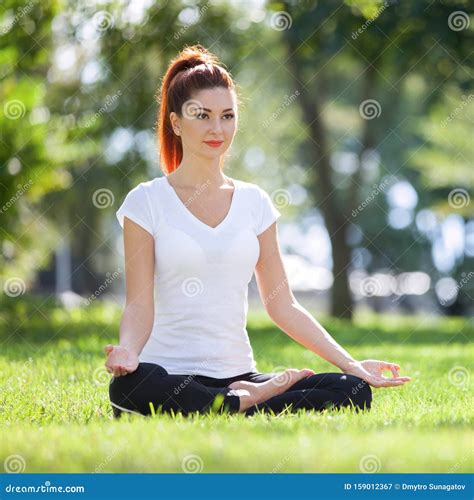 Yoga Outdoor. Happy Woman Doing Yoga Exercises, Meditate in the Park ...