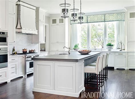 Traditional white kitchen painted with Sherwin Williams paints - Interiors By Color