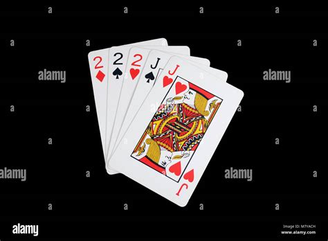 Isolated full house poker hand Stock Photo - Alamy