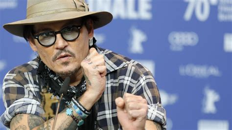 Johnny Depp Talks 'Minamata' & "The Power Of The Small" - Berlin