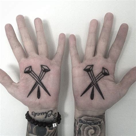 15 Brutal Nail Tattoos • Tattoodo