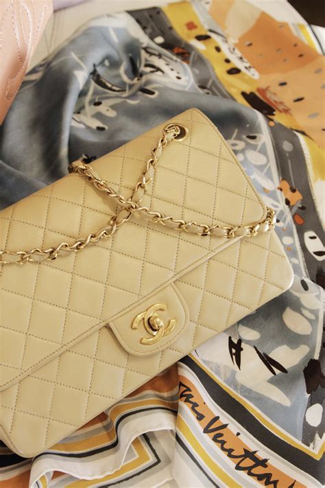 This Chanel beige flap is the perfect everyday bag! It blends effortlessly with any color ...