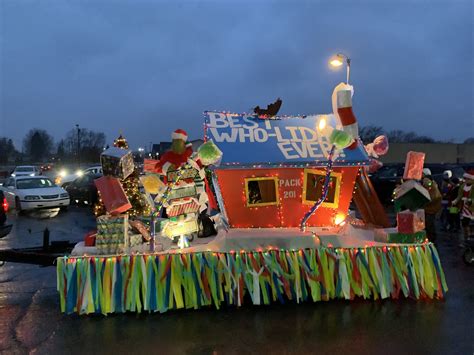 a float is decorated with lights and streamers