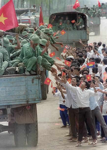 Cambodian people bidding farewell to Vietnamese volunteer soldiers during the withdrawal of ...