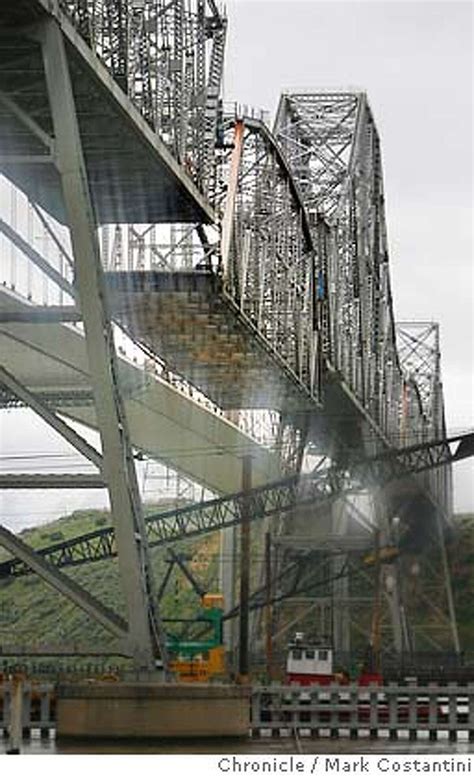 Old Carquinez Bridge is disappearing -- slowly / Piece by piece, crews start to dismantle 1927 ...