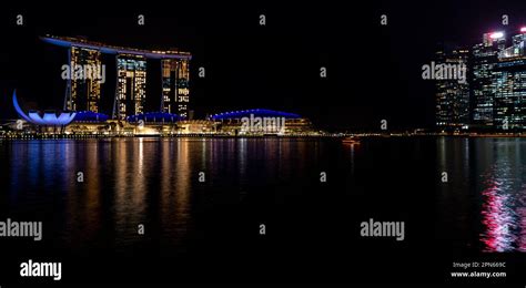 Night view of the Singapore skyline and waterfront Stock Photo - Alamy